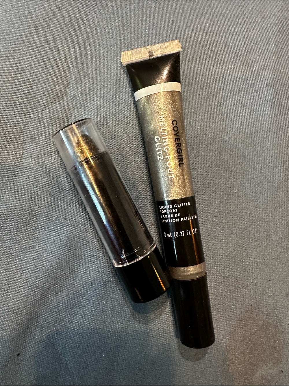 COVERGIRL Melting Pout Glitz Liquid Glitter Topcoat and Silver Sparkle lipstick